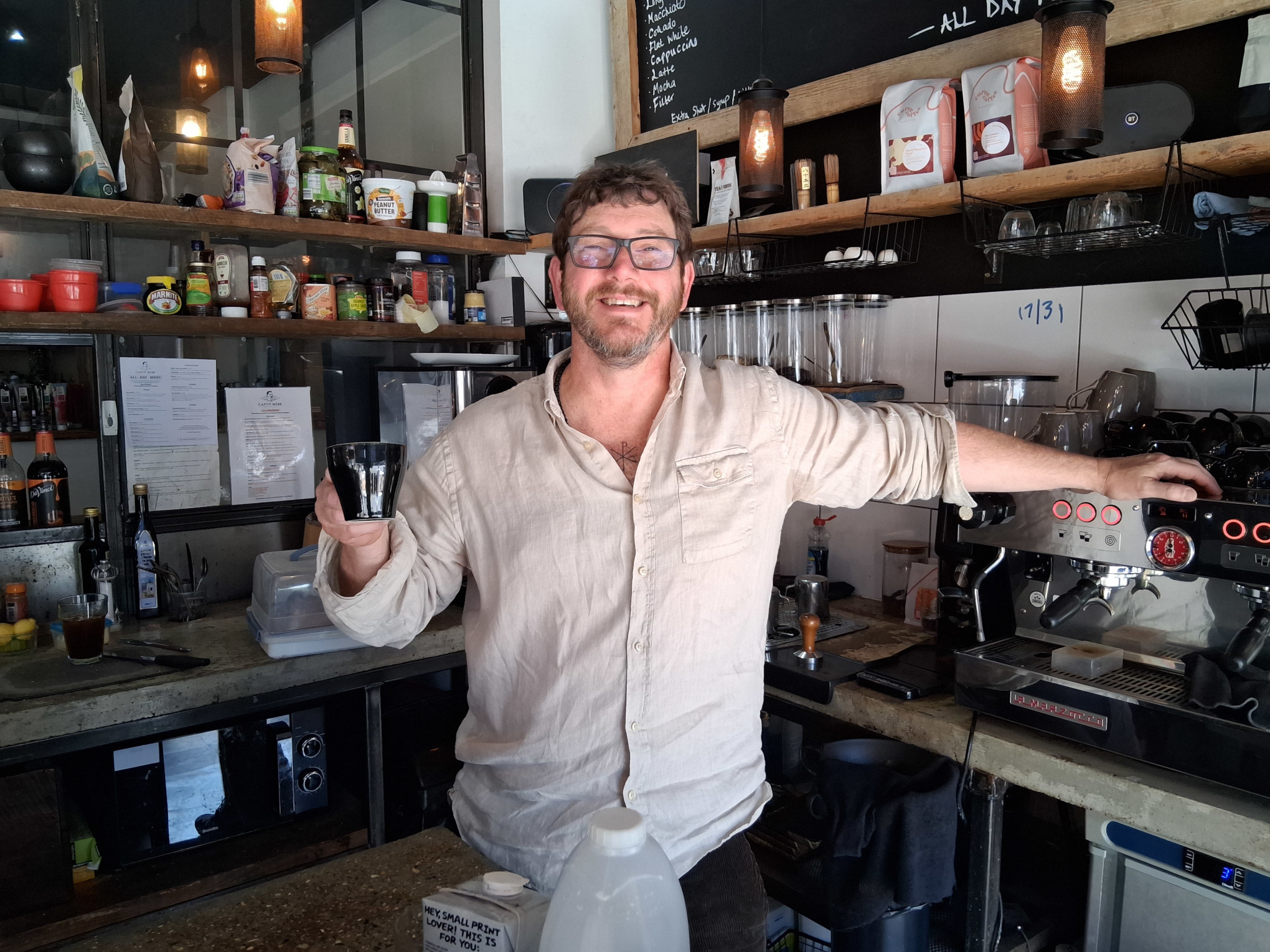 Simon having coffee in Captain Webb